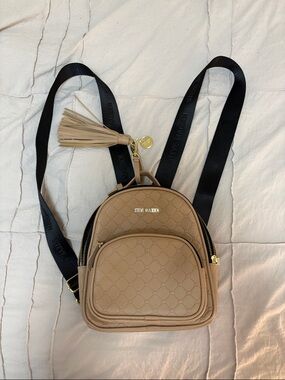 Steve Madden tan quilted mini backpack with adjustable black straps